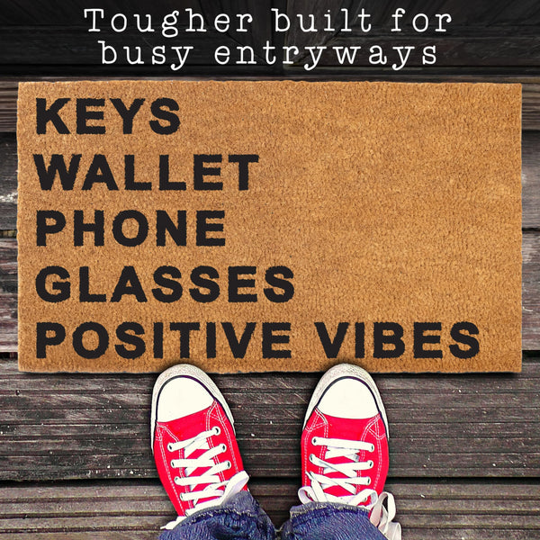 keys wallet phone glasses coir outdoor mat positive vibes