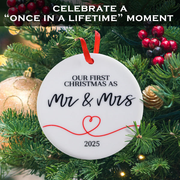 Christmas ornament with 'Our First Christmas as Mr & Mrs 2025' text on a decorated tree.
