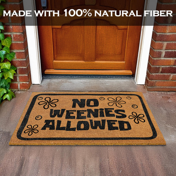 Doormat with 'No Weenies Allowed' text on a wooden door matting.