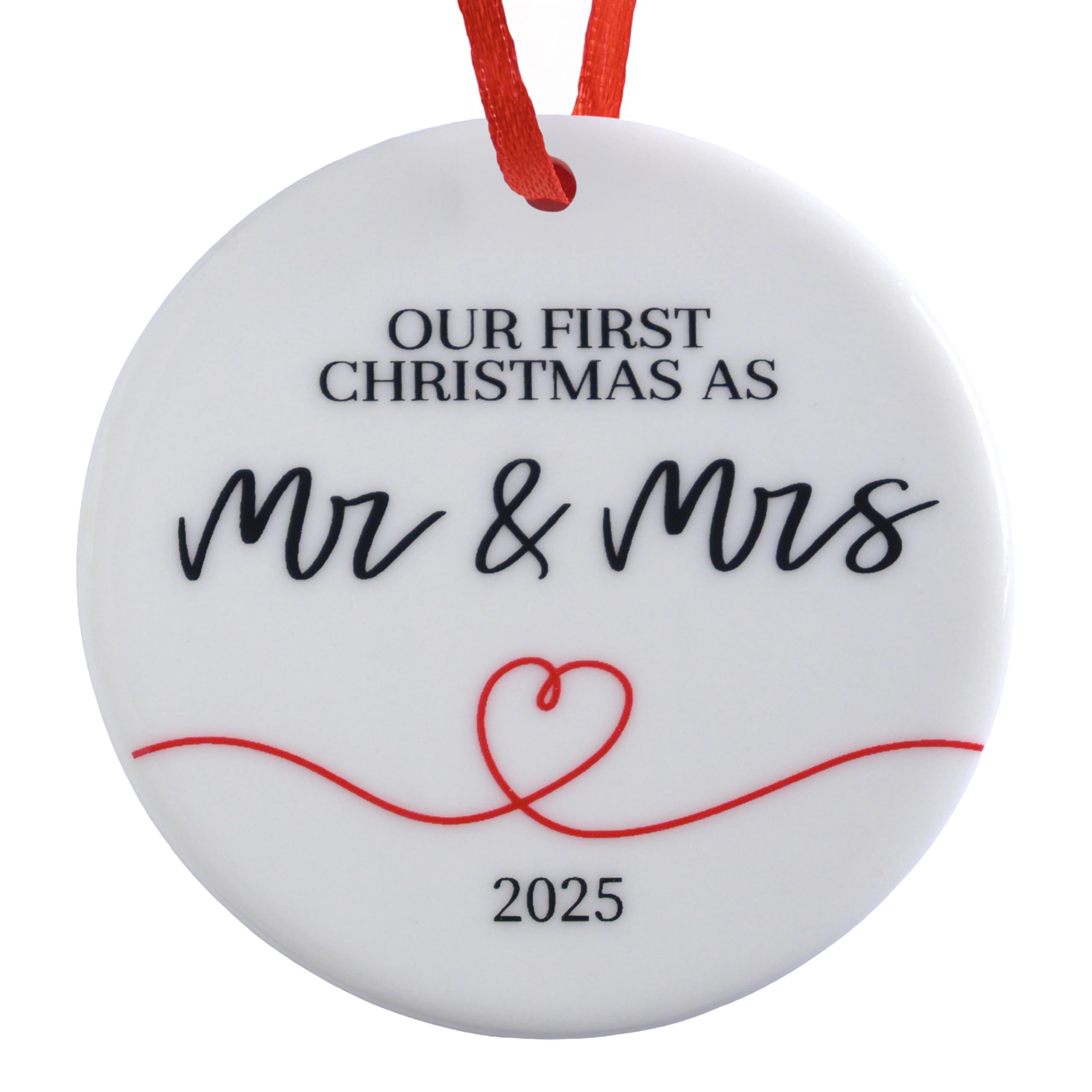 Round white ornament with 'Our First Christmas as Mr & Mrs' text and a red heart, hanging on a red ribbon.