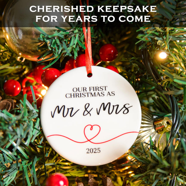 Christmas ornament with 'Our First Christmas as Mr & Mrs 2025' text on a festive background.