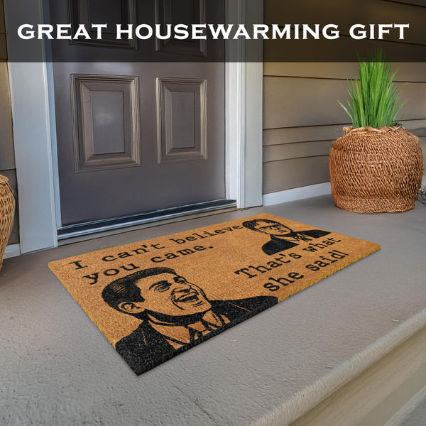 Doormat with humorous design in front of a house entrance