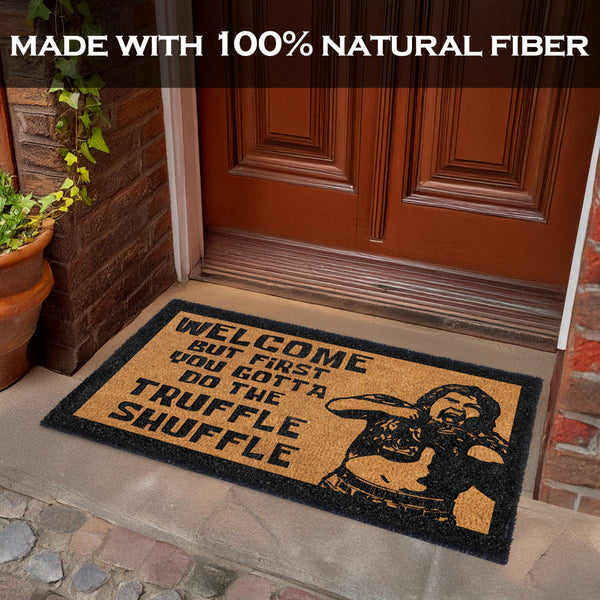 Doormat with humorous design and text on a stone porch.