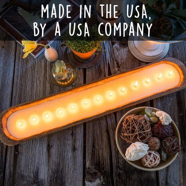 Decorative candle holder with lit candles on a wooden surface, featuring text 'Made in the USA, by a USA Company'.
