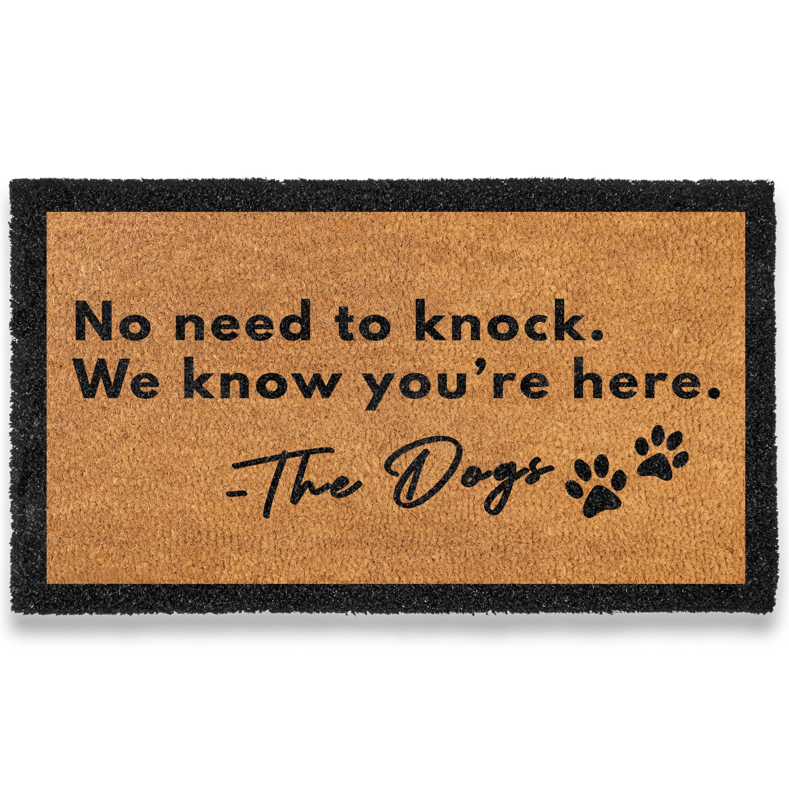 Doormat with text 'No need to knock. We know you're here. The Dogs' on a white background
