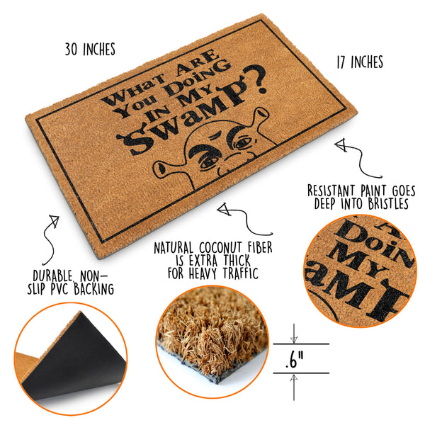 Doormat with humorous design and text, featuring measurements and material details.