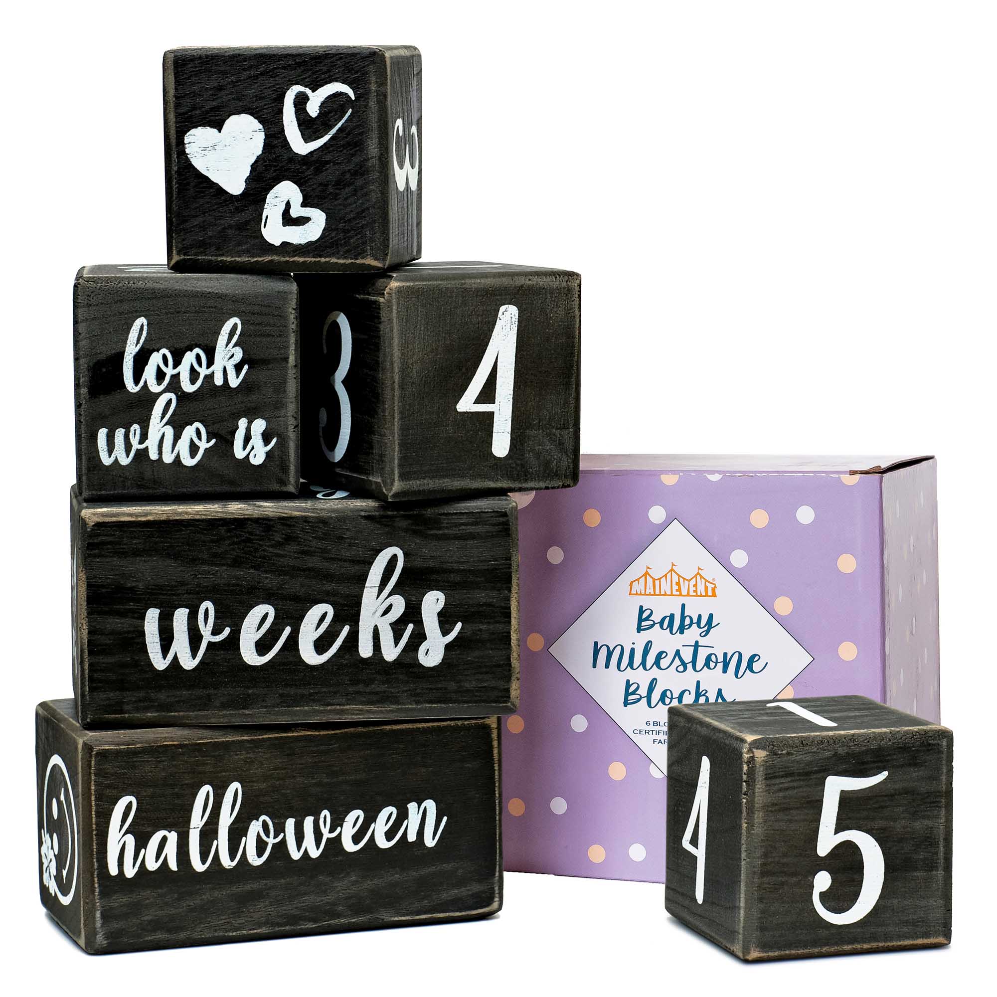 A set of wooden blocks with numbers and words printed on them, used as a baby milestone prop, displayed alongside its packaging box.