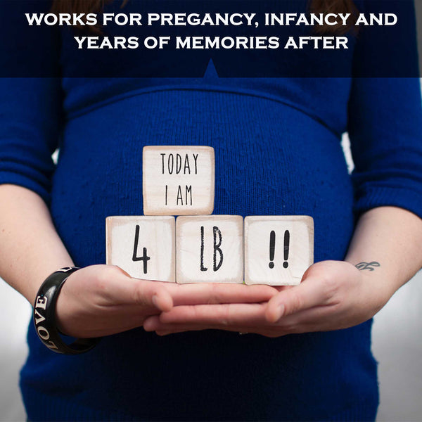 white baby monthly milestone blocks baby age