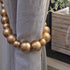 products/tiebacks_gold_LS_03_wood-bead-curtain-tieback-set-of-2-curtain-holdback-tie-curtain-pull-back-holder-tieback-hooks-drape-beaded-boho-gold.jpg