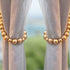products/tiebacks_gold_LS_04_wood-bead-curtain-tieback-set-of-2-curtain-holdback-tie-curtain-pull-back-holder-tieback-hooks-drape-beaded-boho-gold.jpg