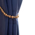 products/tiebacks_gold_hero_04_wood-bead-curtain-tieback-set-of-2-curtain-holdback-tie-curtain-pull-back-holder-tieback-hooks-drape-beaded-boho-gold.jpg