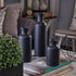 products/vasesblack_lifestyle_21_vases-set-of-3-matte-farmhouse-vase-for-decor-set-of-3-modern-black-vases-home-decor-set-of-3-ceramic-vase.jpg